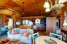Rustic oceanfront home with screened porch, free WiFi, deck, & beach access