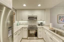 Second Floor villa w/ ocean views from deck - steps from beach for sun and sand