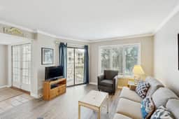 Second-floor villa with lovely ocean views, pickleball, pool & screened deck
