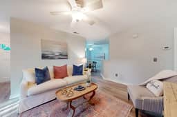 Stylish dog friendly, ground-floor getaway with pool, washer/dryer, & AC