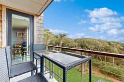 Third floor home with stunning private-deck ocean views - steps from beach