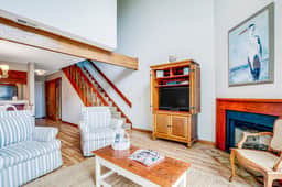 Three-story ocean-view villa with pool, balcony, charcoal grill, & central AC