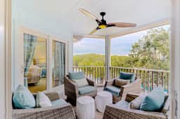 Two-story condo near beach with on-site pool & screened deck