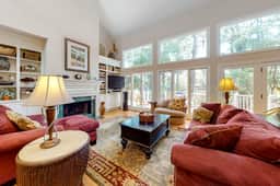 Updated island estate with serene lagoon views & 2 decks - bike to beach