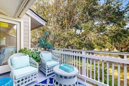 Updated townhouse with outside deck, shared pool, tennis, pickleball and beach
