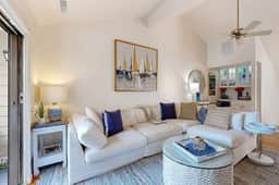 Updated townhouse with outside deck, shared pool, tennis, pickleball and beach