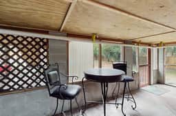 Welcoming home steps to the beach and downtown with WiFi and screened porch
