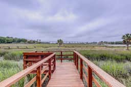 Beautiful home on lush lot with boardwalk to marsh, large deck, wifi, central ac - Image 3