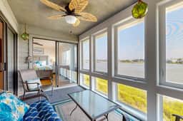 Elegant riverfront condo with access to private W/D, central AC, and pool access - Image 2