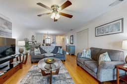 Elegant riverfront condo with access to private W/D, central AC, and pool access - Image 3