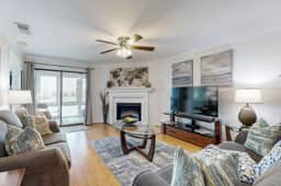 Elegant riverfront condo with access to private W/D, central AC, and pool access - Image 4