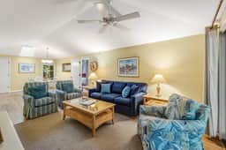 Charming Island Getaway with a Furnished Deck Offering Forest & Fairway Views - Image 3