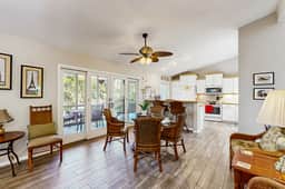 Golf course home with deck, porch & lagoon view - 1 block to beach, 1 dog OK - Image 5