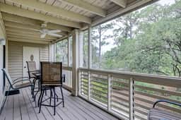Fully updated condo with serene view, enclosed balcony, WiFi, W/D, pool, & gym - Image 2