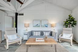 Lakefront home with lagoon view, deck & AC - close to beach, golf, & pools - Image 2