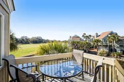 Stylish beach villa with three decks, and golf course views - Image 3