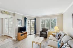 Second-floor villa with lovely ocean views, pickleball, pool & screened deck - Image 5