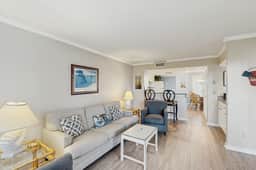 Second-floor villa with lovely ocean views, pickleball, pool & screened deck - Image 4