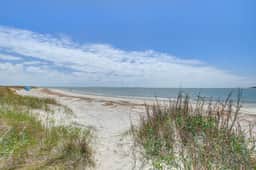 Beachfront villa with dolphin viewing deck, shared pools, tennis, golf & more - Image 3
