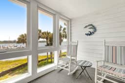 Second-floor villa w/ river views & community pool, tennis courts, and dock - Image 3