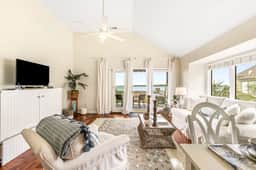 2nd floor villa with water views, lovely balcony & w/d - walk to Beach Club - Image 5