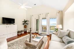 2nd floor villa with water views, lovely balcony & w/d - walk to Beach Club - Image 2