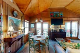 Rustic oceanfront home with screened porch, free WiFi, deck, & beach access - Image 4
