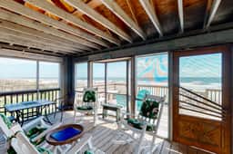 Rustic oceanfront home with screened porch, free WiFi, deck, & beach access - Image 2