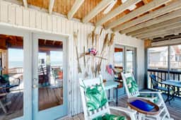 Rustic oceanfront home with screened porch, free WiFi, deck, & beach access - Image 3