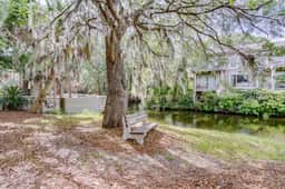 Quaint top floor lagoon view condo w/ community pool access - walk to the beach - Image 4