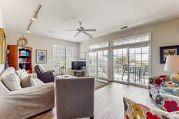 First-floor villa w/partial ocean views, covered porch -one block from the beach - Image 2