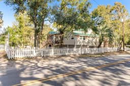 Welcoming home steps to the beach and downtown with WiFi and screened porch - Image 2