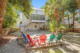 Palmetto-lined home with porches, yard & hammock - walk to beach/town - Image 2