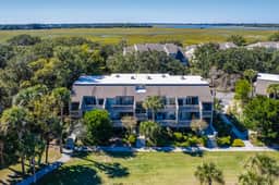 Lovely condo near beach with enclosed porch, pool, tennis, and golf access - Image 2