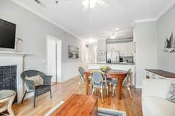 2nd-floor retreat with screened porch, shared pool, WiFi, central AC & elevator - Image 4