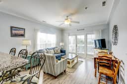 Fantastic condo with water-view, pool, balcony, central AC, & washer/dryer - Image 5