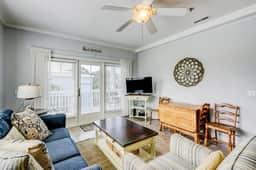 Fantastic condo with water-view, pool, balcony, central AC, & washer/dryer - Image 2