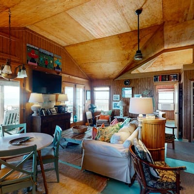 Rustic oceanfront home with screened porch, free WiFi, deck, & beach access