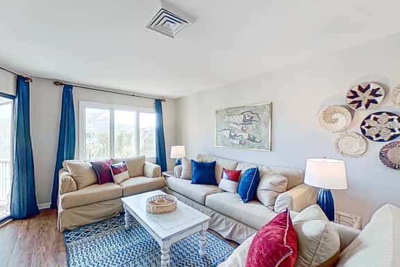 Lovely top floor villa in Wild Dunes with partial ocean views, pool, & W/D - Image 1