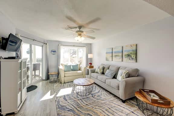 1st-floor condo with beach access, patio, & outdoor pool - snowbirds welcome - Image 1