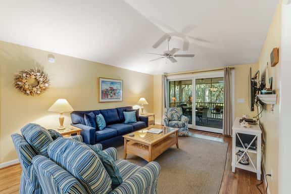 Charming Island Getaway with a Furnished Deck Offering Forest & Fairway Views - Image 1