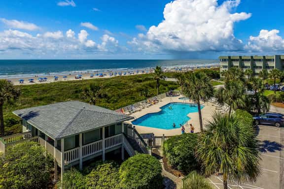 Ocean front condo villa near restaurants & state park with beach access, pool & pier - Image 1