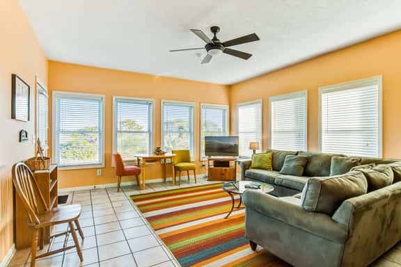 Marsh-view home with large rooftop deck & outdoor shower - steps from beach - Image 1