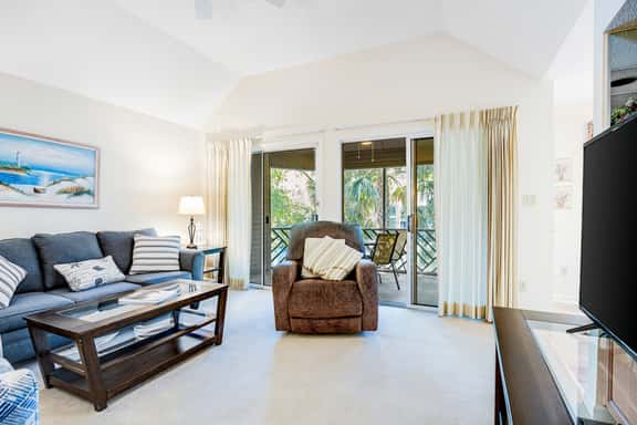Lagoon view, second floor villa w/ screened in porch, short walk to the beach - Image 1