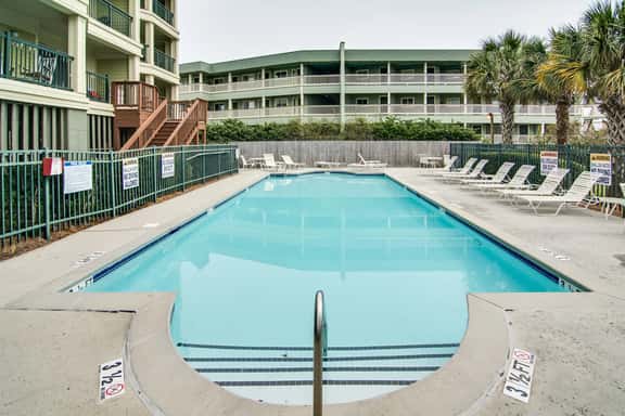 Beachfront villa w/ ocean views, private deck, pool access – steps from beach - Image 1