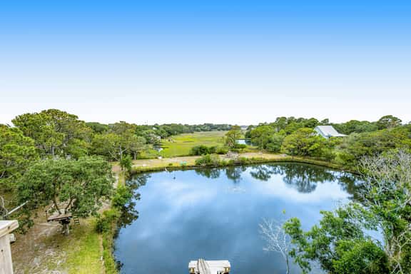 Fantastic coastal retreat with private dock, gas grill, two decks, & fast WiFi - Image 1