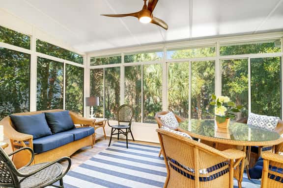 Palmetto-lined home with porches, yard & hammock - walk to beach/town - Image 1