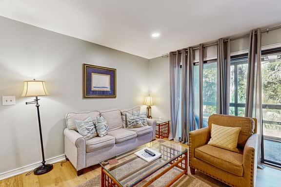 Renovated lagoon-view condo with screened porch & WiFi - steps from the beach - Image 1