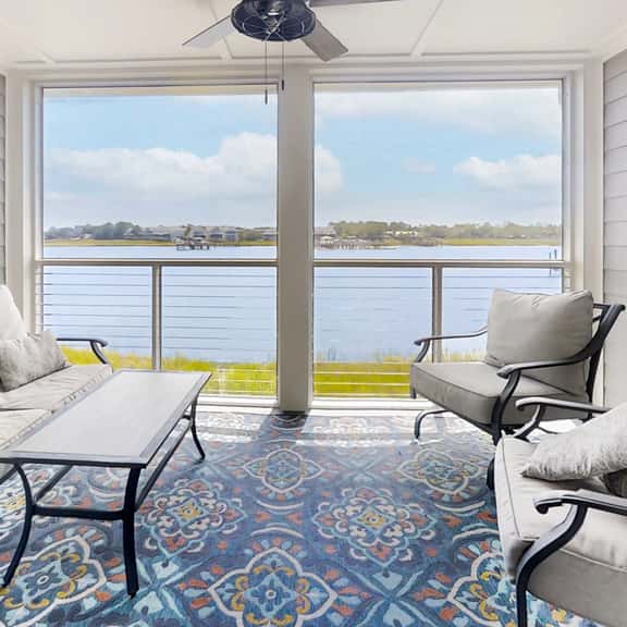 Newly renovated two-story waterfront condo with screened porch, pool, & tennis - Image 1