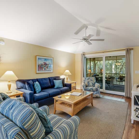 Charming Island Getaway with a Furnished Deck Offering Forest & Fairway Views - Image 1